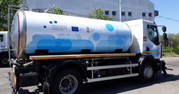 On the front line: Trucks from EU aid are helping disinfect the streets of Obrenovac